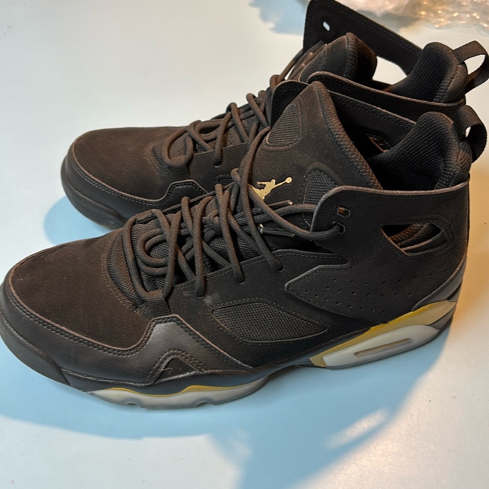 Nike Air Jordan Men’s Size 9.5 Black with Gold accents. Like New. Light wear